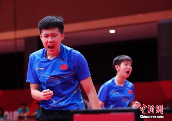 資料圖：雅加達亞運會，王楚欽/孫穎莎奪得混雙冠軍。 <a target='_blank' href='/'>中新社</a>記者 劉關關 攝