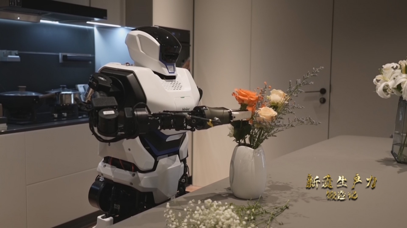 人形機(jī)器人插花。